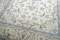 Close-up detail of 2000s Nain rug from Iran / Persia showing Wool weave