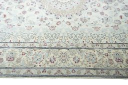 Corner detail of New Nain rug showing border pattern and Wool pile