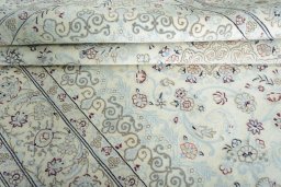 Close-up detail of New Nain rug from Iran / Persia showing Wool weave