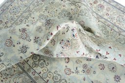 Surface texture of New Nain rug with natural Wool and intricate pattern