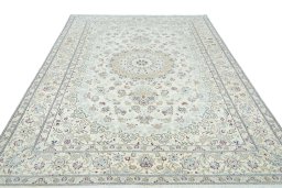 Surface texture of New Nain rug with natural Wool and intricate pattern