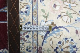 Backside of handmade 2000s Nain rug showing knot structure and weave density