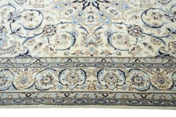 Corner detail of New Nain rug showing border pattern and Wool pile