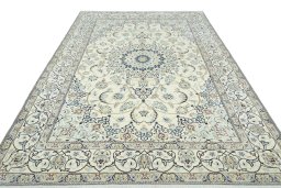 Surface texture of 2000s Nain rug with natural Wool and intricate pattern