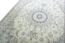 Backside of handmade 2000s Nain rug showing knot structure and weave density