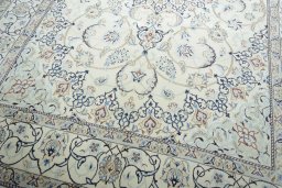 Close-up detail of 2000s Nain rug from Iran / Persia showing Wool weave