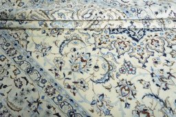 Close-up detail of 2000s Nain rug from Iran / Persia showing Wool weave