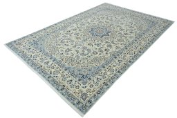 Corner detail of 2000s Nain rug showing border pattern and Wool pile