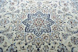 Central medallion detail of 2000s Nain rug from Iran / Persia