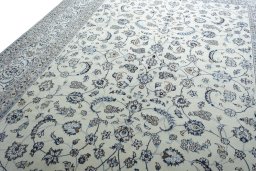 Backside of handmade New Nain rug showing knot structure and weave density