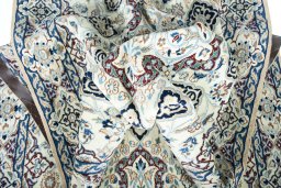 Close-up detail of 2000s Nain rug from Iran / Persia showing Wool weave