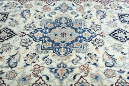 Central medallion detail of 2000s Nain rug from Iran / Persia