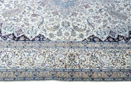 Corner detail of 2000s Nain rug showing border pattern and Cork pile
