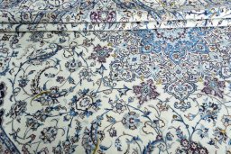 Close-up detail of 2000s Nain rug from Iran / Persia showing Cork weave