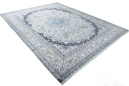 Close-up detail of 2000s Nain rug from Iran / Persia showing Cork weave