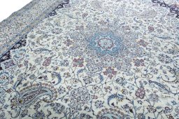 Backside of handmade 2000s Nain rug showing knot structure and weave density