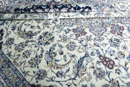 Close-up detail of 2000s Nain rug from Iran / Persia showing Cork weave