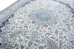 Backside of handmade 2000s Nain rug showing knot structure and weave density