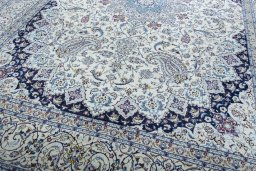 Close-up detail of 2000s Nain rug from Iran / Persia showing Cork weave