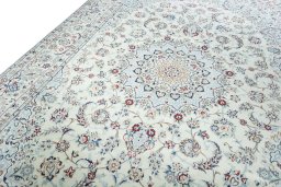 Backside of handmade 2000s Nain rug showing knot structure and weave density