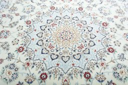 Central medallion detail of 2000s Nain rug from Iran / Persia