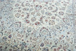 Close-up detail of 2000s Nain rug from Iran / Persia showing Wool weave