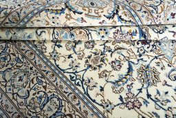 Close-up detail of New Nain rug from Iran / Persia showing Wool weave