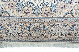 Full view of New Nain rug from Iran / Persia, 311 × 197 cm in Beige tones