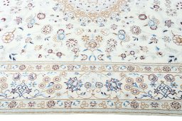 Corner detail of New Nain rug showing border pattern and Wool pile