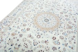 Backside of handmade New Nain rug showing knot structure and weave density