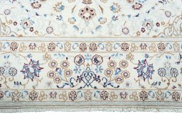 Full view of New Nain rug from Iran / Persia, 303 × 200 cm in Beige tones