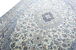 Backside of handmade 2000s Nain rug showing knot structure and weave density