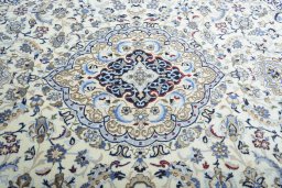 Central medallion detail of 2000s Nain rug from Iran / Persia