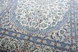 Close-up detail of 2000s Nain rug from Iran / Persia showing Wool weave