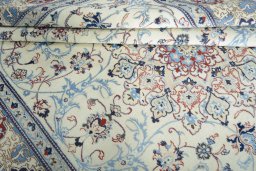 Close-up detail of 2000s Nain rug from Iran / Persia showing Wool weave
