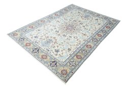 Corner detail of 2000s Nain rug showing border pattern and Wool pile