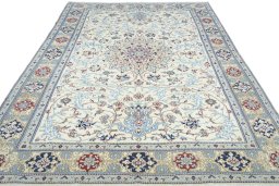 Surface texture of 2000s Nain rug with natural Wool and intricate pattern