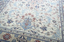 Close-up detail of 2000s Nain rug from Iran / Persia showing Wool weave