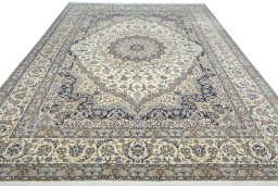 Surface texture of 2000s Nain rug with natural Cork and intricate pattern