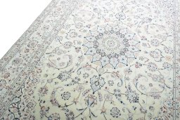 Backside of handmade New Nain rug showing knot structure and weave density