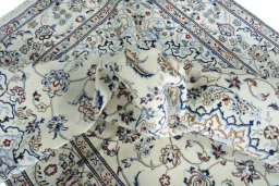 Surface texture of New Nain rug with natural Wool and intricate pattern