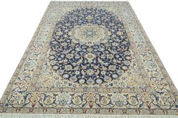 Surface texture of 2000s Nain rug with natural Wool and intricate pattern