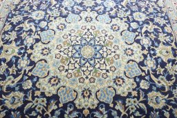 Central medallion detail of 2000s Nain rug from Iran / Persia