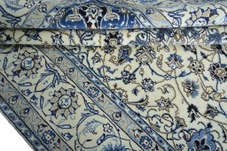 Close-up detail of 2000s Nain rug from Iran / Persia showing Wool weave