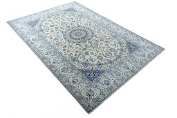 Close-up detail of 2000s Nain rug from Iran / Persia showing Wool weave