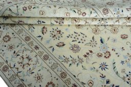 Close-up detail of 2000s Nain rug from Iran / Persia showing Wool weave