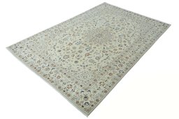 Corner detail of 2000s Nain rug showing border pattern and Wool pile