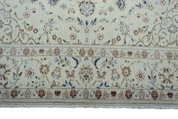 Full view of 2000s Nain rug from Iran / Persia, 305 × 200 cm in Beige tones