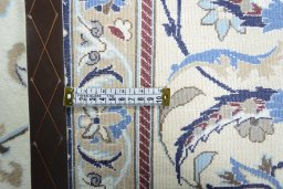 Backside of handmade 2000s Nain rug showing knot structure and weave density