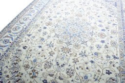 Backside of handmade 2000s Nain rug showing knot structure and weave density